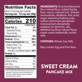 Krusteaz Sweet Cream Pancake Mix 8-pack display on shelf.
