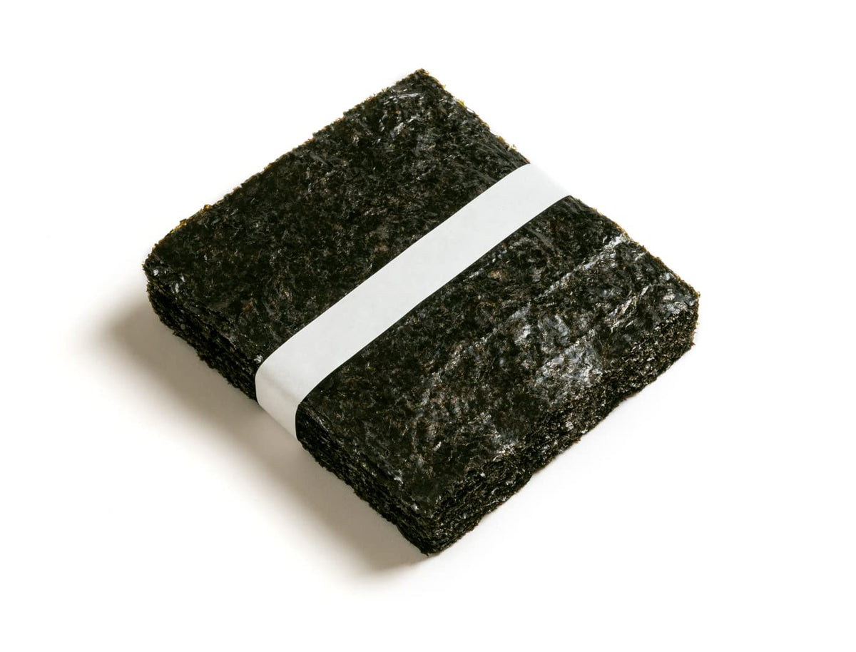 Open package of KS Twice Roasted Seaweed Sheets ready for immediate sushi prep.
