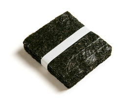Open package of KS Twice Roasted Seaweed Sheets ready for immediate sushi prep.