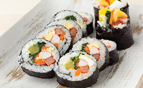 KS Twice Roasted Seaweed Sheets rolled with rice for tasty sushi.