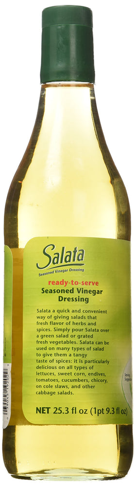 Kühne Salata seasoned vinegar dressing on salad bowl highlighting convenient ready-to-use flavor
