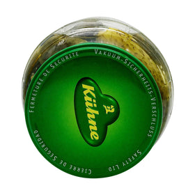 Kuhne Gundelsheim barrel pickles close-up, glossy crunch and herbs visible.