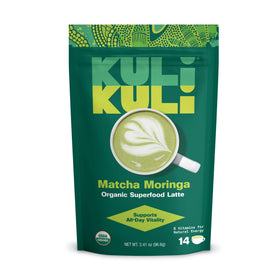 Kuli Kuli matcha-moringa latte powder tub ready for energizing cup