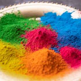 Kids playing with Kulture Khazana Holi color powder in joyful scene