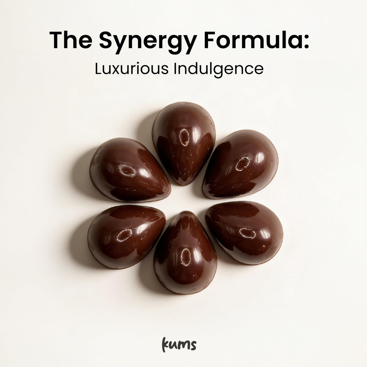Kums Dark Chocolate Tabs melting texture on tongue suggests smooth, rich cacao experience.