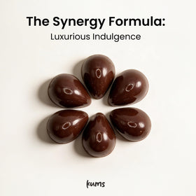 Kums Dark Chocolate Tabs melting texture on tongue suggests smooth, rich cacao experience.