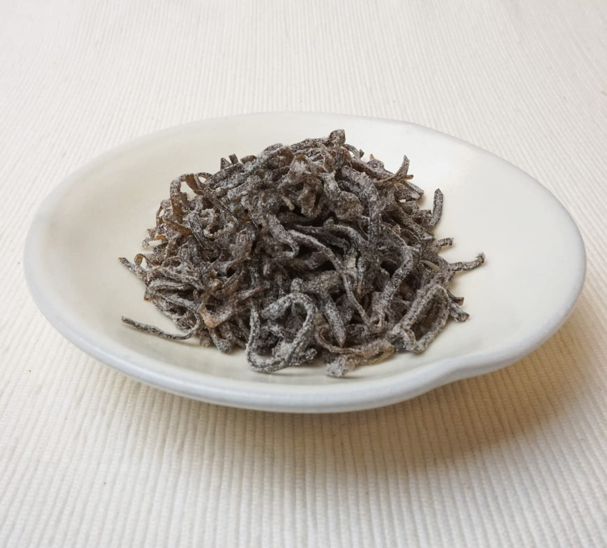 Kurakon kelp sheets closeup reveals sturdy texture suitable for broths and pickles.