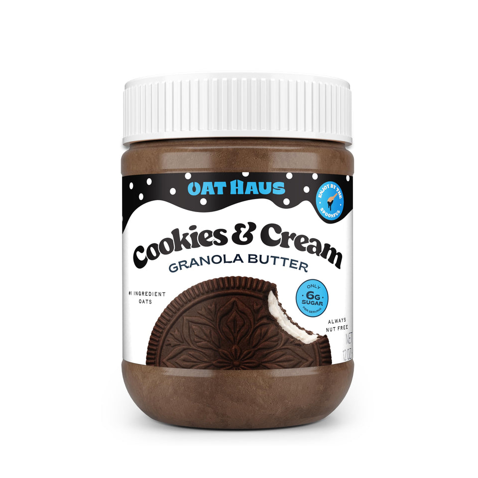 KWEEN Oat Haus Cookies & Cream Granola Butter jar on kitchen counter, nut-free snack option.