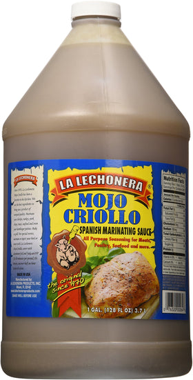 La Lechonera Mojo Criollo bottle pour enhances grilling with zesty flavor.