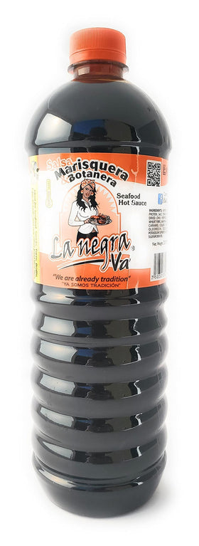 La Negra Va salsa marisquera jar opened, ready to flavor shellfish dishes.