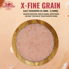 LA SALT CO Kashmir pink salt jar close-up shows vibrant pink color and minerals.