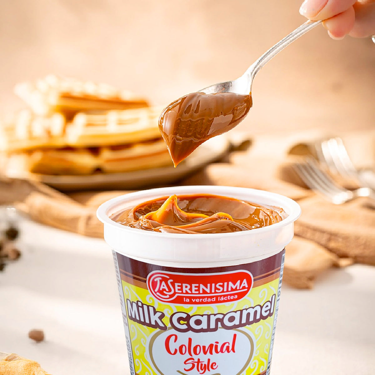 La Serenisima Dulce de Leche bottle on a kitchen counter inspires baking ideas.