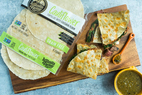 La Tortilla Factory cauliflower tortilla in hand, ready for quick meals.