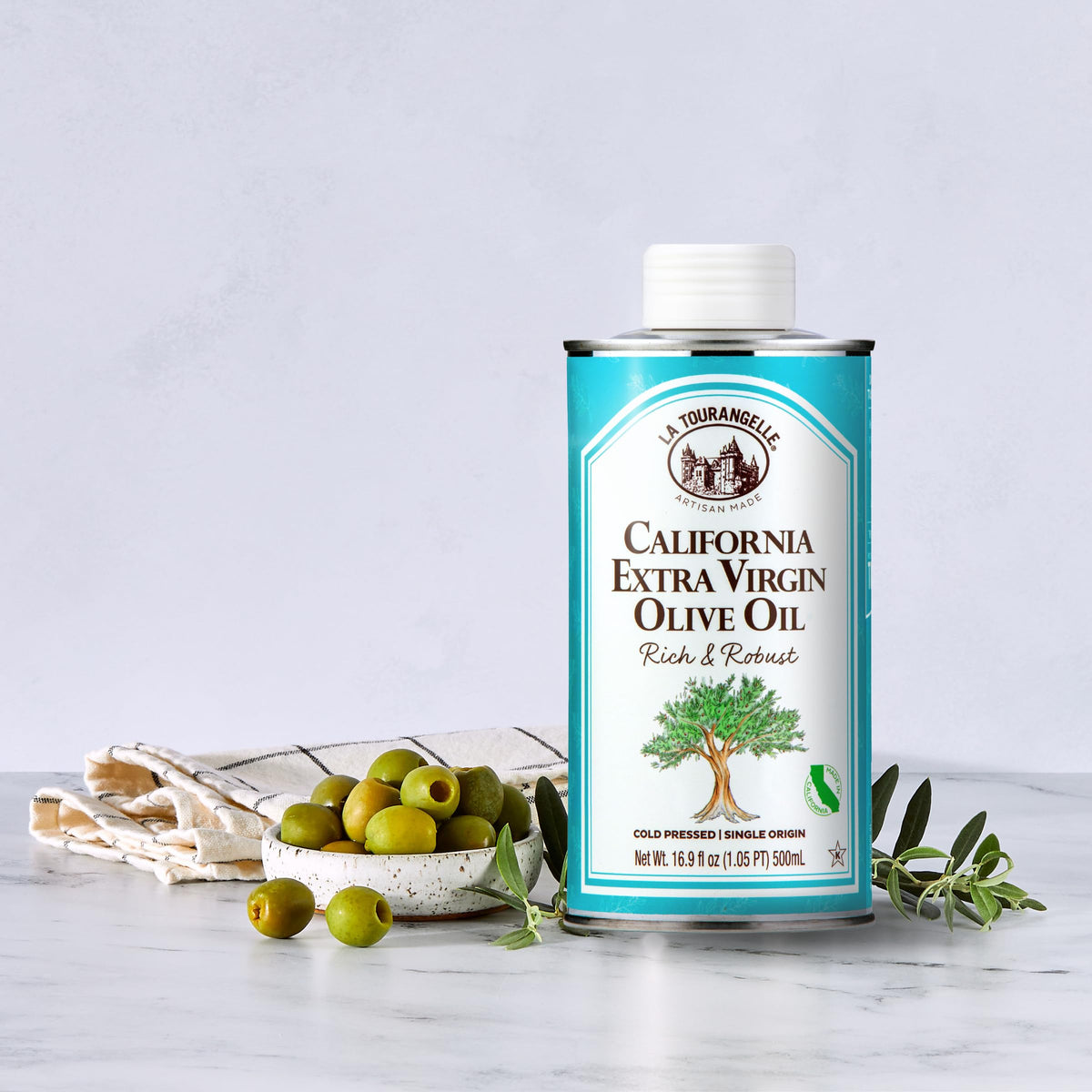 La Tourangelle California olive oil color amber signals robust polyphenol-rich oil.