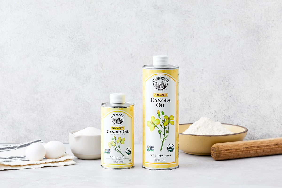 Pouring La Tourangelle Organic Canola Oil for high-heat sauté