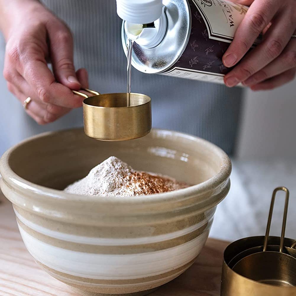 La Tourangelle roasted walnut oil pour demonstrating smooth texture ideal for drizzling and baking
