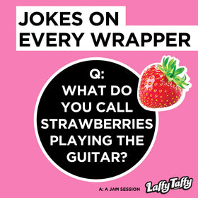 Close-up of stretchy strawberry candy highlighting its chewy, pliable texture.