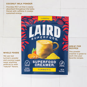 Laird Superfood coffee cup with turmeric creamer being poured into coffee.