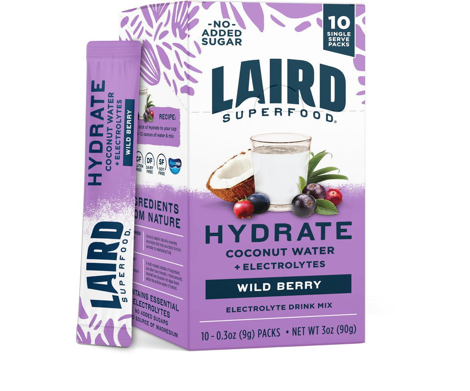 Laird Superfood Hydrate Wild Berry stick pour into glass for on-the-go hydration