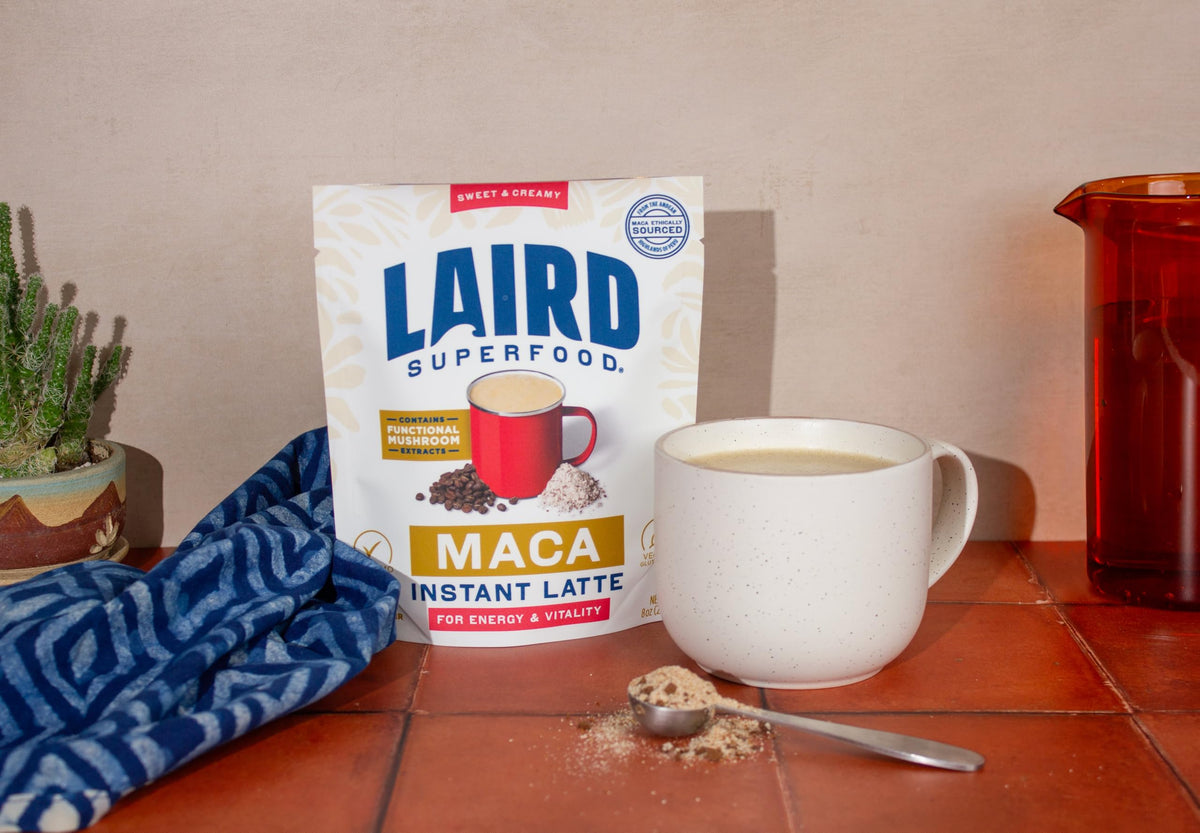 Laird Superfood Maca Instant Latte scoop of maca powder ready to blend into a creamy drink.