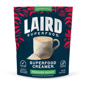 Laird Superfood non-dairy reduced sugar creamer powder in a 16 oz bag for unsweetened coffee.