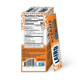 Laird Superfood Pineapple Mango Hydrate stick close-up with bright flavors.