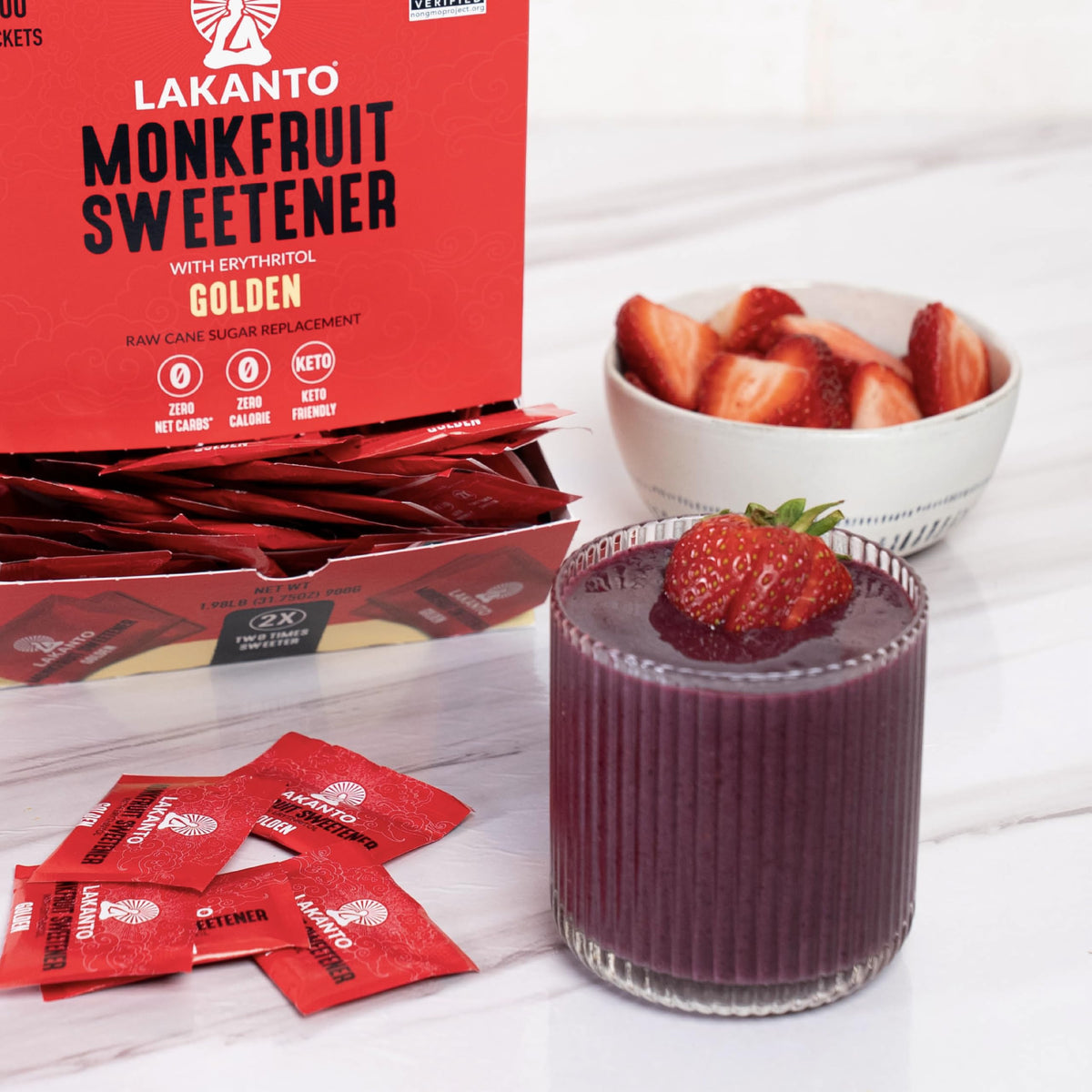 Hands with Lakanto sachet showing portable sweetness on the go.