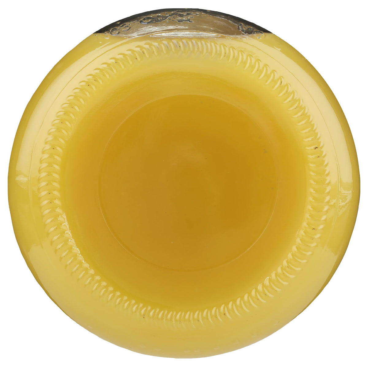 Lakewood Pineapple Juice bottle pour over ice for summer drinks.