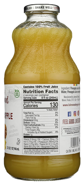 Lakewood Pineapple Juice bottle beside celebratory drinks.