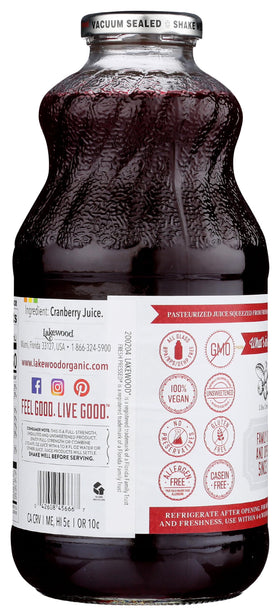 Lakewood Pure Cranberry Juice glass bottle close-up showing branding and label.