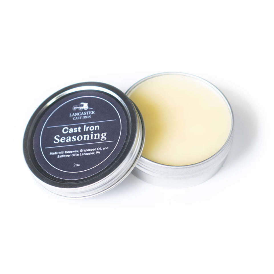 Lancaster Cast Iron Seasoning bottle pour demonstrates easy application for a smooth finish.