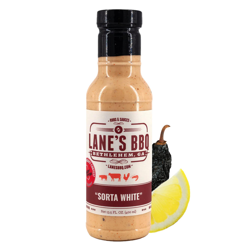 Lane's Sorta White BBQ Sauce bottle pour showing creamy tang for grilling