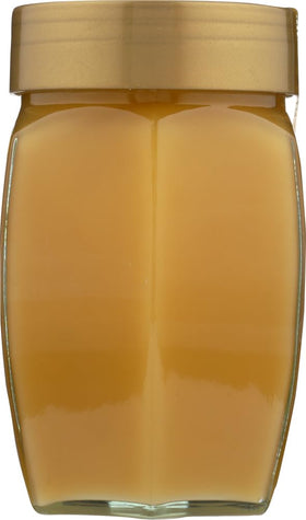 Langnese Creamy Country Honey close-up showing pourable, creamy consistency