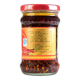 Lao Gan Ma Spicy Chili Crisp chunky bits ready to elevate dishes.
