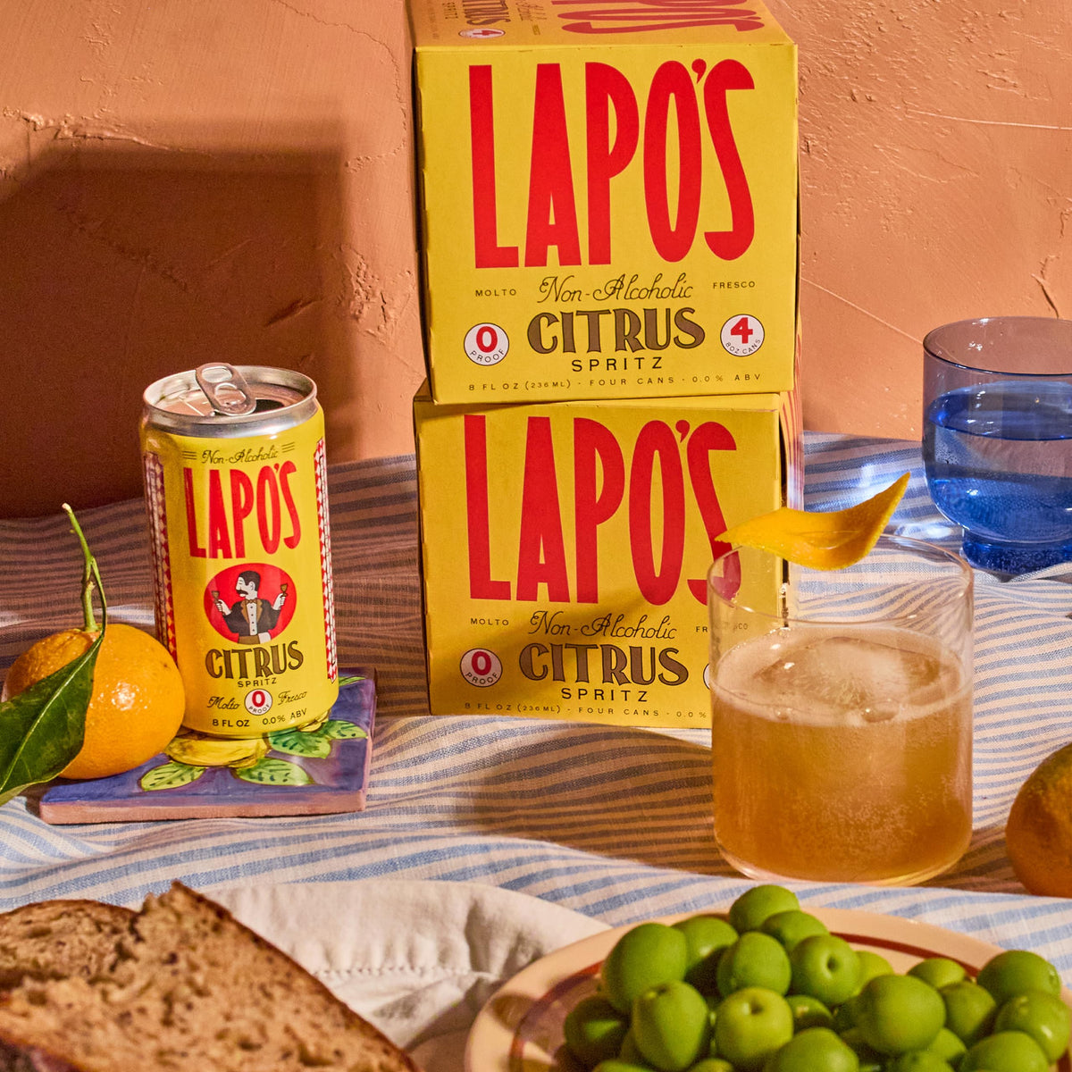 Lapo's Citrus Spritz on a sunny brunch table, gluten-free option for guests.