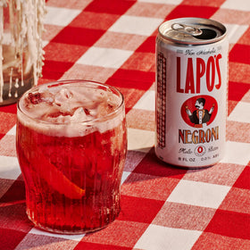 Lapo's Negroni close-up shows a sparkling finish for celebratory mocktails.