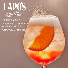 Lapo's non-alcoholic Negroni-style mix in a tall glass.
