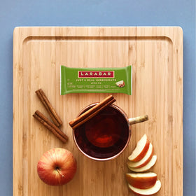 LÄRABAR Apple Pie bar cross-section reveals fruity, nut-filled interior.