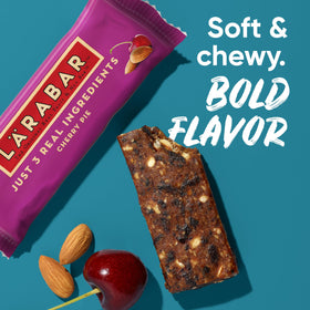 LÄRABAR Cherry Pie bar on-the-go image demonstrates grab-and-go convenience.