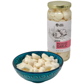 Lara's Gourmet Passions pickled garlic on an antipasto plate with olives.