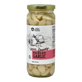 Lara's Gourmet Passions pickled garlic jar closeup of crunchy cloves ready to savor.