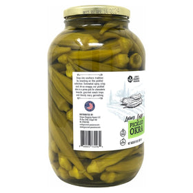 Lara's pickled okra on a charcuterie board, ready for entertaining.