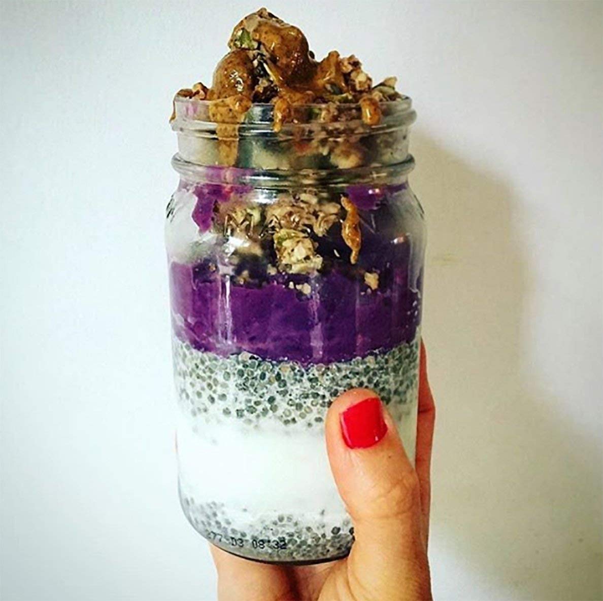 Serving Berrylicious Granola Clusters in a bowl with milk, Lark Ellen Farm