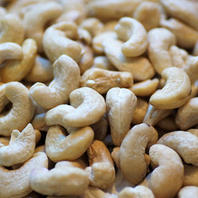 Lark Ellen Farm sprouted salted cashews in serving bowl beside coffee