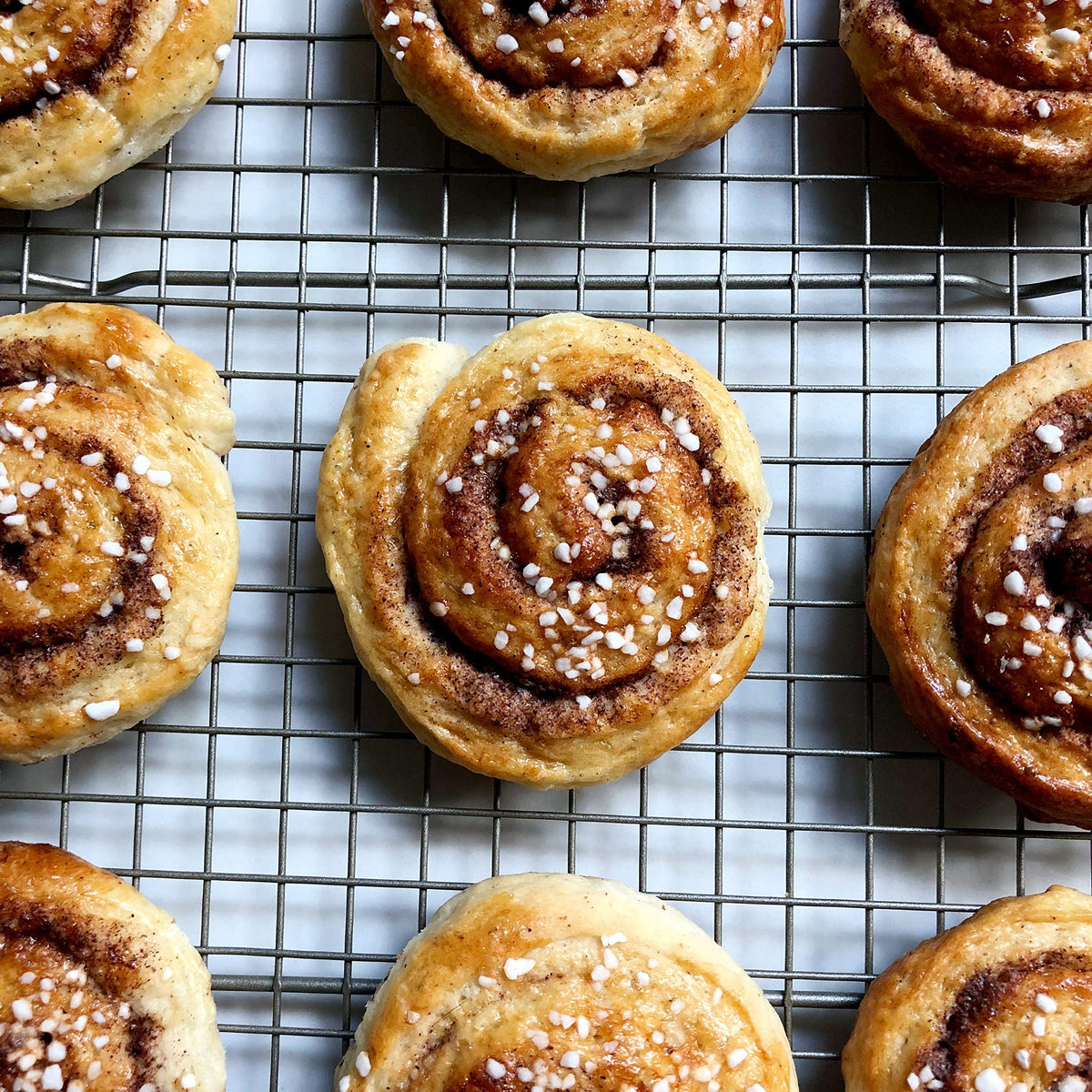 Decorative Lars' Own pearls sprinkled on pastries with bright food coloring.