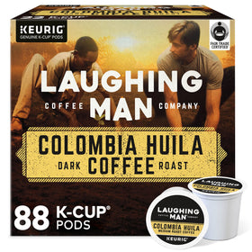 Laughing Man Colombia Huila K-Cup pods on a kitchen counter for quick, single-serve mornings.