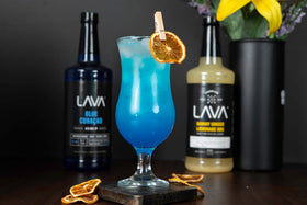 Front label of LAVA Blue Curacao Syrup highlights quality orange extract.