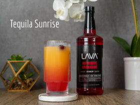 LAVA Grenadine pour into glass, revealing rich pomegranate sweetness for cocktails.