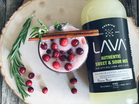 LAVA sweet & sour mix bottle with glass of cocktail ready
