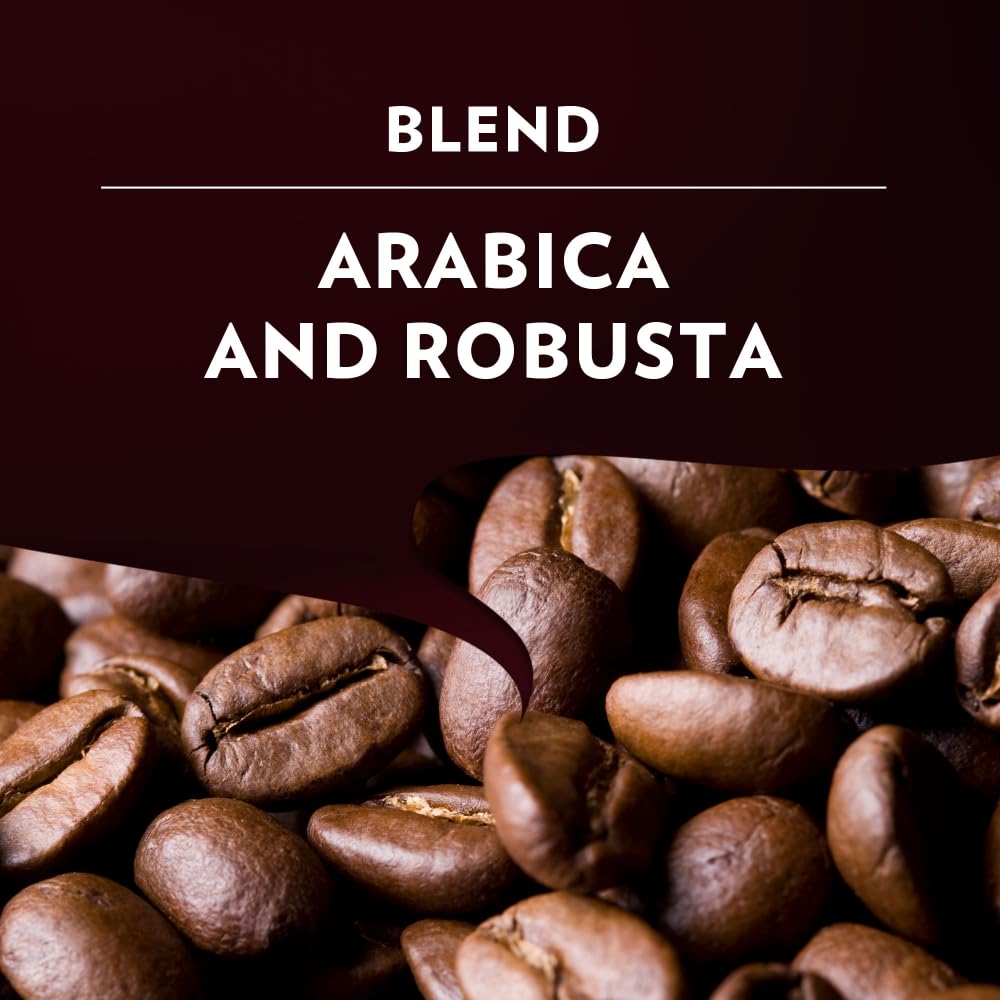 Lavazza Expert Classico capsules in hand for single-serve convenience.